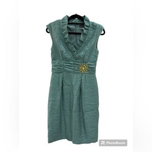 Iridescent Jessica Howard dress, size 6. V-neck ruffle, gold rhinestones.